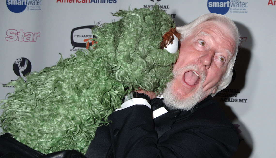 item 2 of Gallery image - Oscar the Grouch and Caroll Spinney during The 33rd Annual Daytime Creative Arts Emmy Awards in New York - Arrivals at Marriott Marquis Hotel in New York City, New York, United States. (Photo by Robin Platzer/FilmMagic)