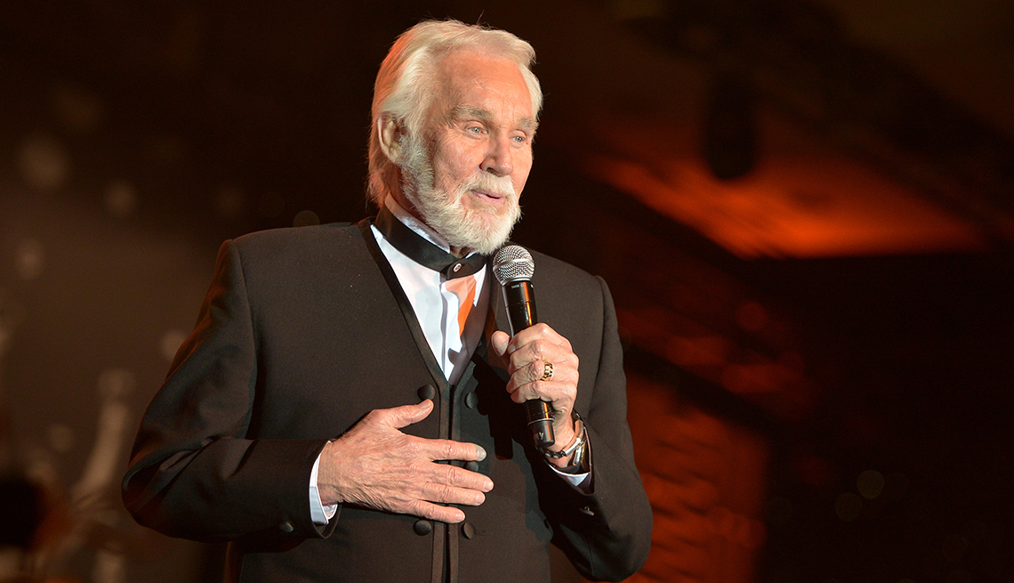 item 53 of Gallery image - Singer Kenny Rogers performs onstage during Muhammad Ali Celebrity Fight Night 20 held at the J W Marriott Desert Ridge Resort and Spa on April 12 2014 in Phoenix Arizona