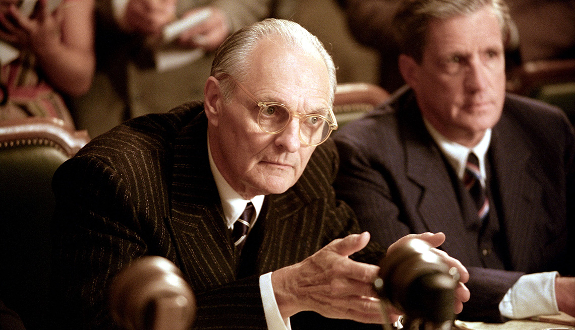 film still of actor alan alda in the two thousand and four film the aviator in a courtroom or congress scene