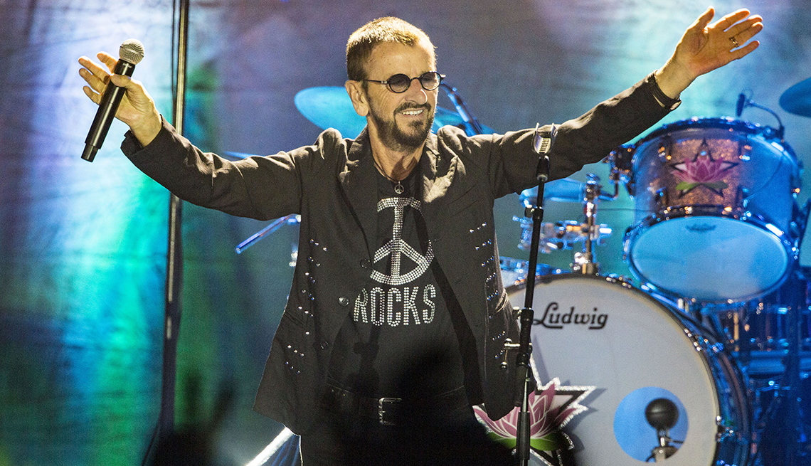 item 3 of Gallery image - Ringo Starr waves his arms to the crowd on stage while performing at Harrahs Resort Southern California