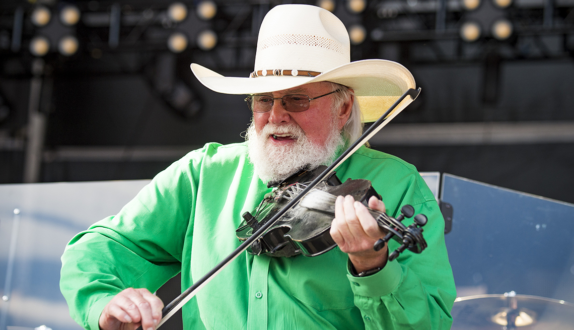 item 33 of Gallery image - Charlie Daniels performs with his fiddle during the Faster Horses Festival in Michigan