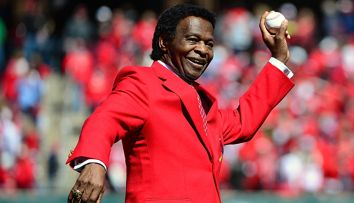 item 22 of Gallery image - Baseball Hall of Famer Lou Brock throws out the first pitch before the Saint Louis Cardinals home opener at Busch Stadium