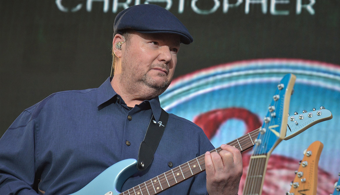 item 1 of Gallery image - Musician Christopher Cross playing his guitar