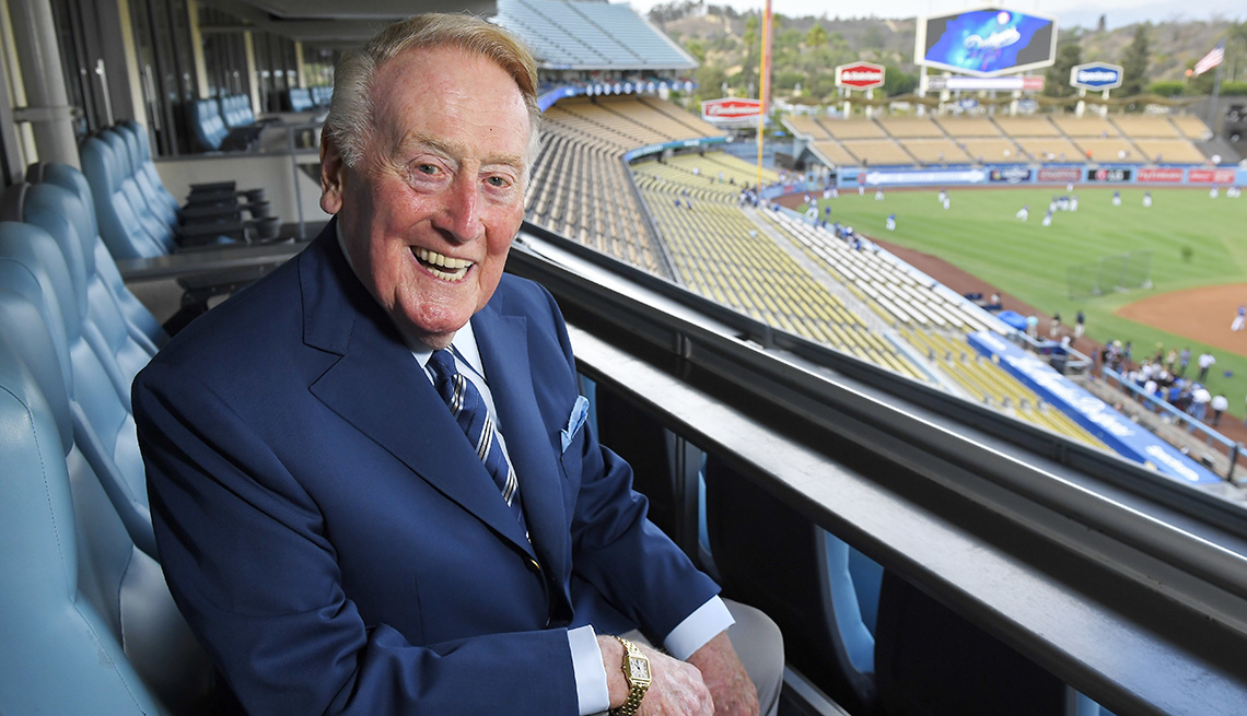 Hall of Fame broadcaster Vin Scully poses for a photo at Dodger Stadium