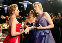 Edie Falco and Jane Lynch talk at the Screen Actors Guild Awards in 2011.
