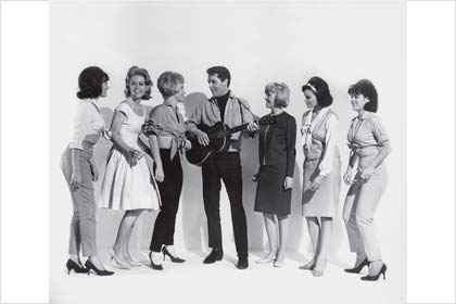 With Elvis Presley and actresses Joan Freeman and Sue Ane Langdon in Roustabout, 1964