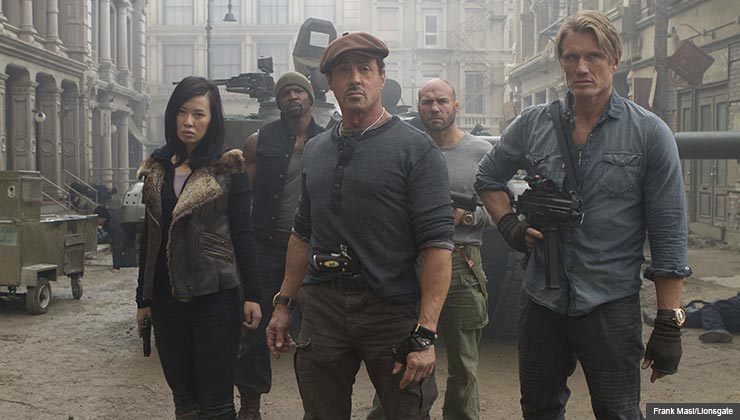 Yu Nan, Sylvester Stallone, Dolph Lundgren, Terry Crews, Randy Couture, back right in THE EXPENDABLES 2