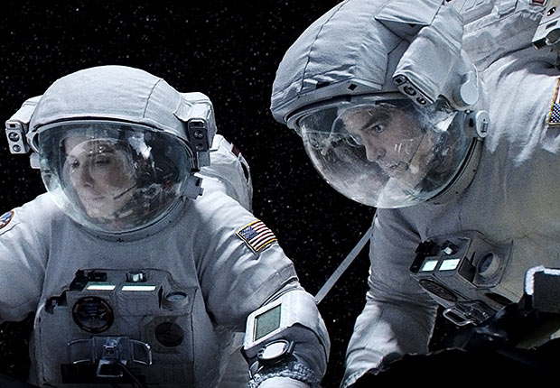 Sandra Bullock and George Clooney in Gravity. Top 10 Movies of 2013.