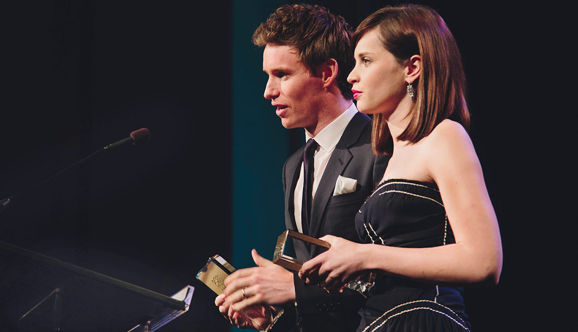 Eddie Redmayne and Felicity Jones, the stars of the night’s Best Picture The Theory of Everything, accepted with thanks to “everyone we met who suffers from ALS.