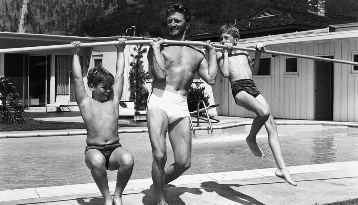 Michael Douglas Through the Years, Kirk Douglas with sons Joel, left, and Michael, right