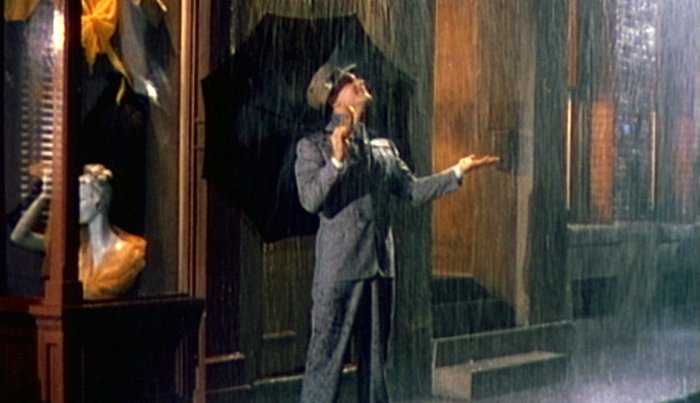 الممثل جين كيلي يلعب دور البطولة في فيلم Singin in the Rain.
