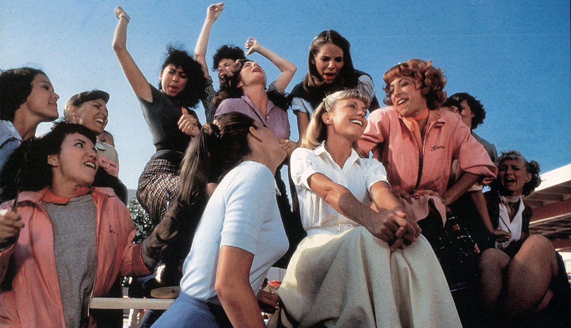 Olivia Newton-John, Didi Conn and the rest of the girls sing in a scene from the 1978 film "Grease"