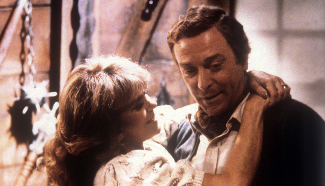 Michael Caine is embraced by Dyan Cannon in a scene from the movie Deathtrap