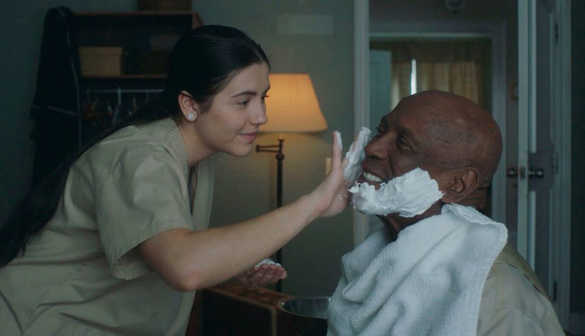 image from the movie the cuban. actress ana golija putting shaving cream on louis gossett junior's  ace