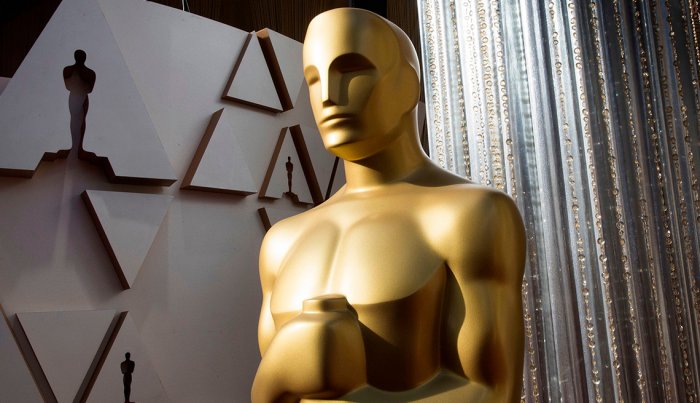 An Oscars statue is displayed on the red carpet area carpet area on the eve of the 92nd Academy Awards