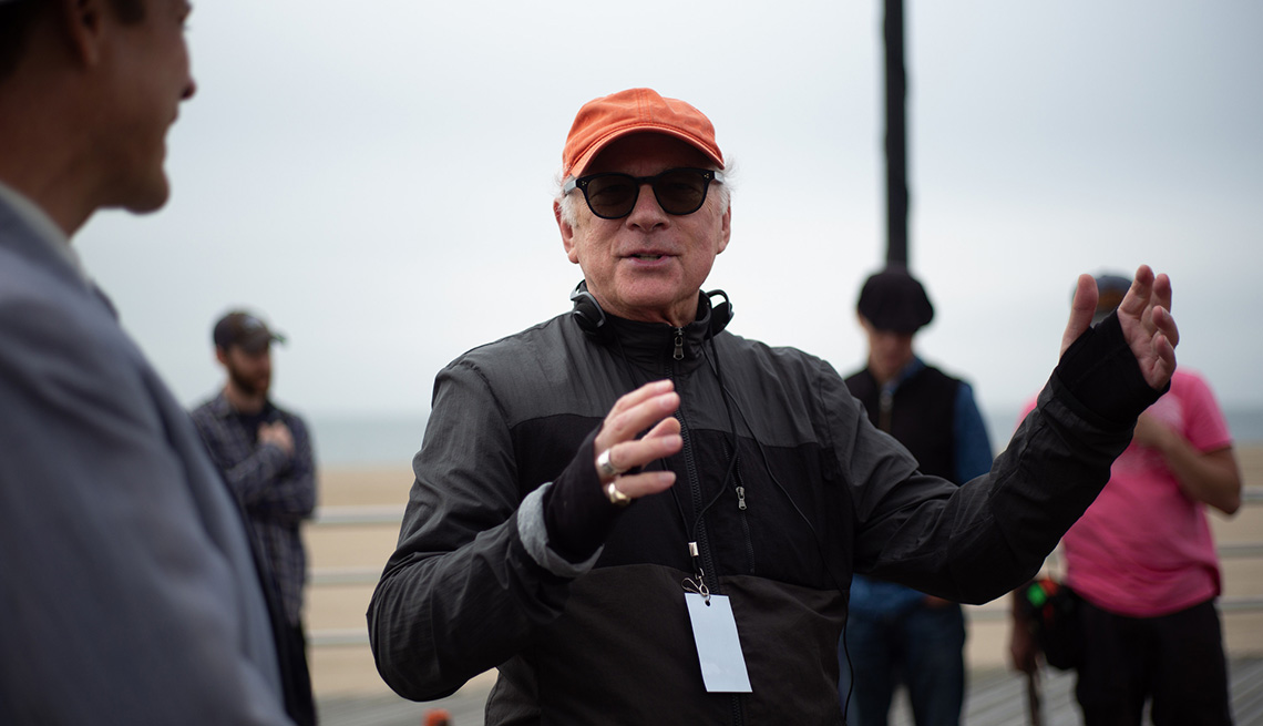 A behind the scenes shot of director Barry Levinson on the set of The Survivor