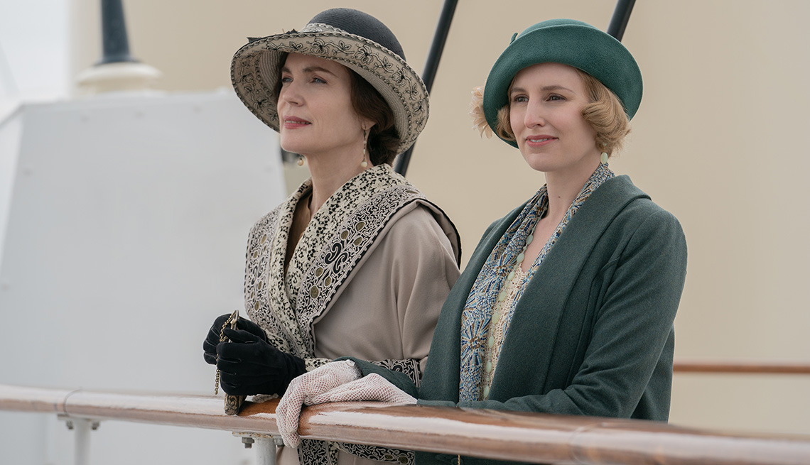 Elizabeth McGovern and Laura Carmichael stand next to each other in Downton Abbey A New Era