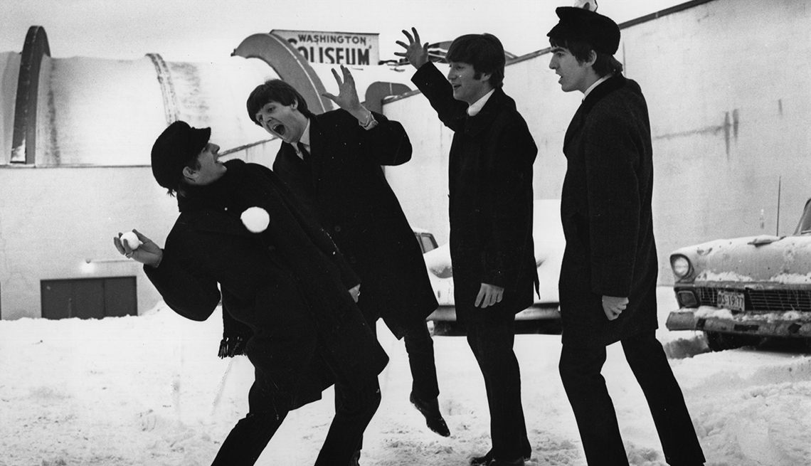 Ringo Starr, Paul McCartney, John Lennon And George Harrison Playing In The Snow At The Airport, USA, The Beatles Slideshow