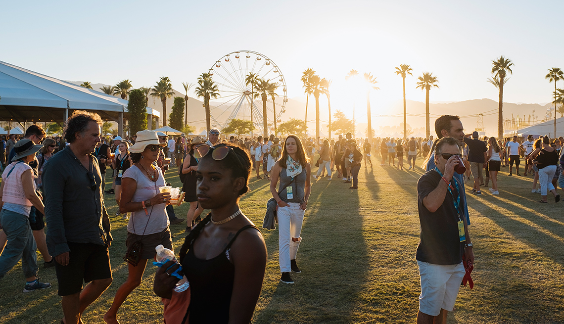 Music fans wander the grounds on the second day of Desert Trip Music Festival