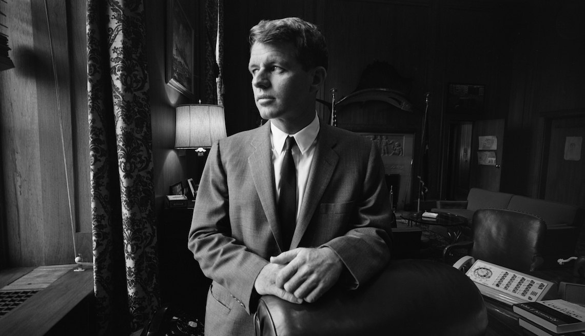 item 7 of Gallery image - United States Attorney General Robert Kennedy poses for a portrait in his Justice Department office circa 1964 in Washington, DC.