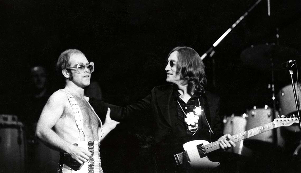 item 5 of Gallery image - John Lennon with Elton John performing live onstage at Madison Square Garden - Lennon's last live appearance.