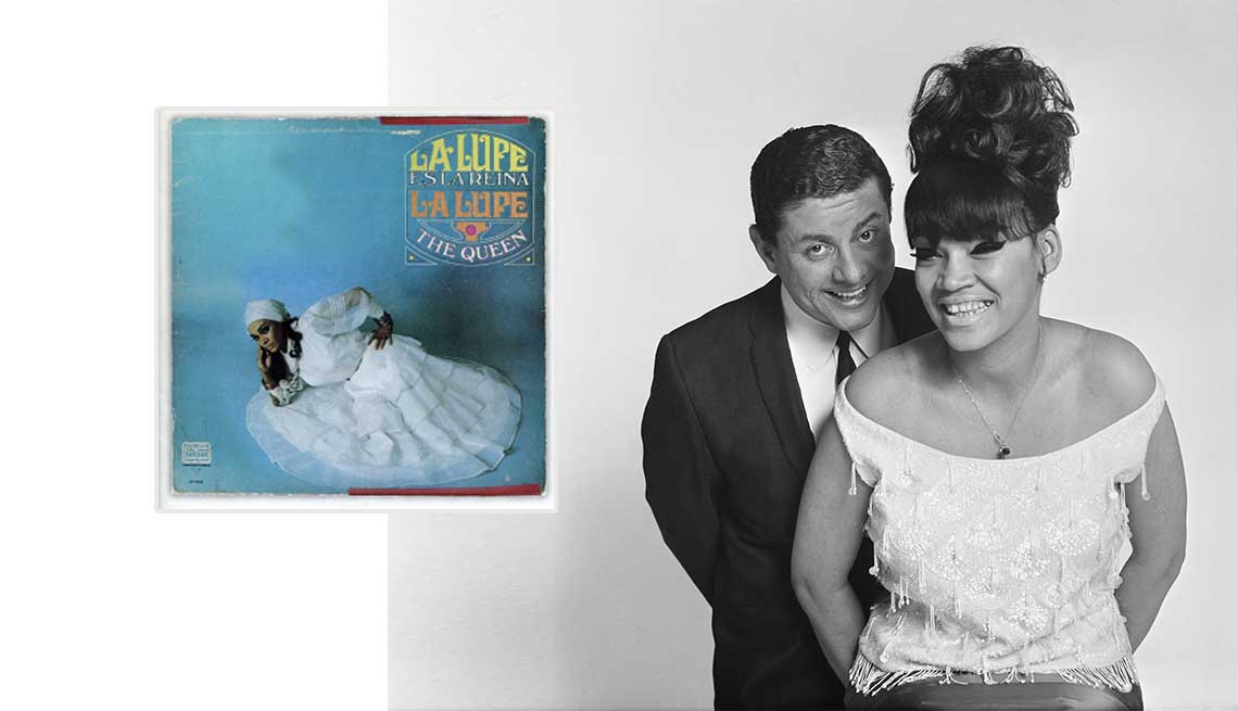 item 5 of Gallery image - Tito Puente y La Lupe al lado de la portada de su disco.