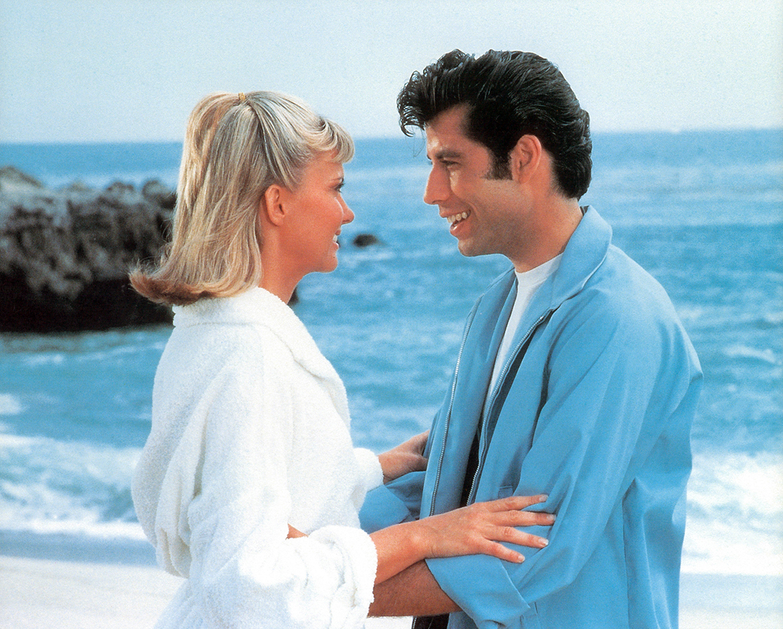 Olivia Newton John and John Travolta on the beach in the film Grease