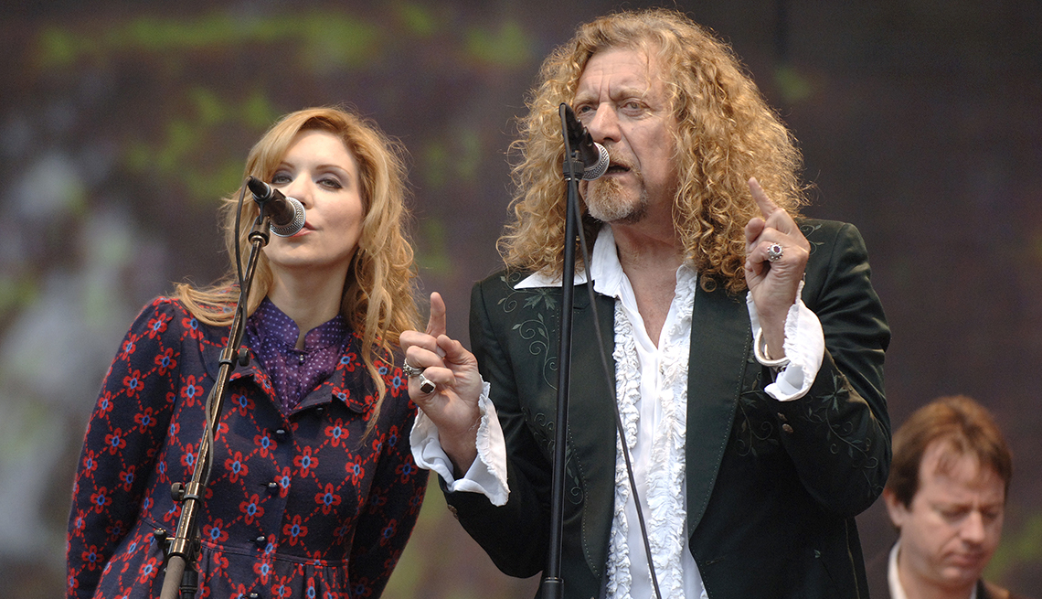 alison krauss and robert plant performing onstage
