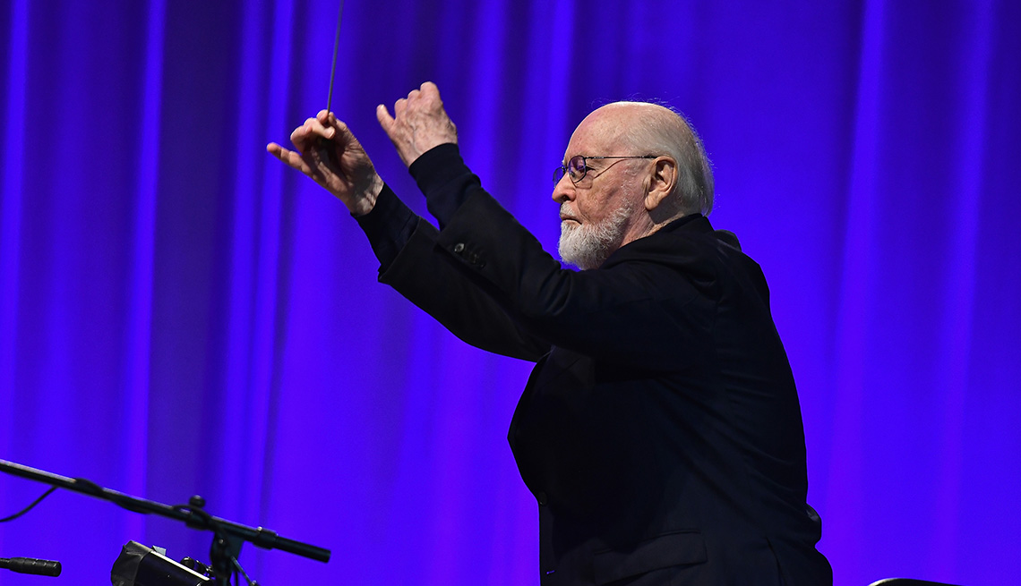 John Williams conducting a musical performance at the Star Wars Celebration in Orlando Florida