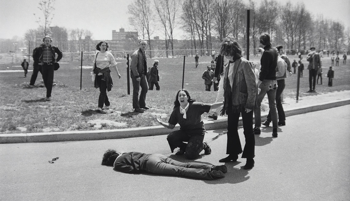 Mary Ann Vecchio kneels over the body of fellow student Jeffrey Miller, who was killed by Ohio National Guard troops during an antiwar demonstration at Kent State University. Ohio, May 4, 1970.