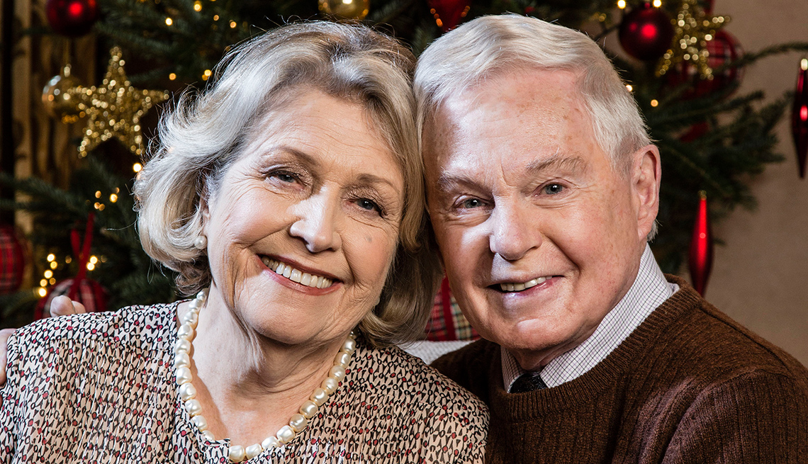 Anne Reid as Celia and Derek Jacobi as Alan mature adults posing for a portrait smiling in 'Last Tango in Halifax'