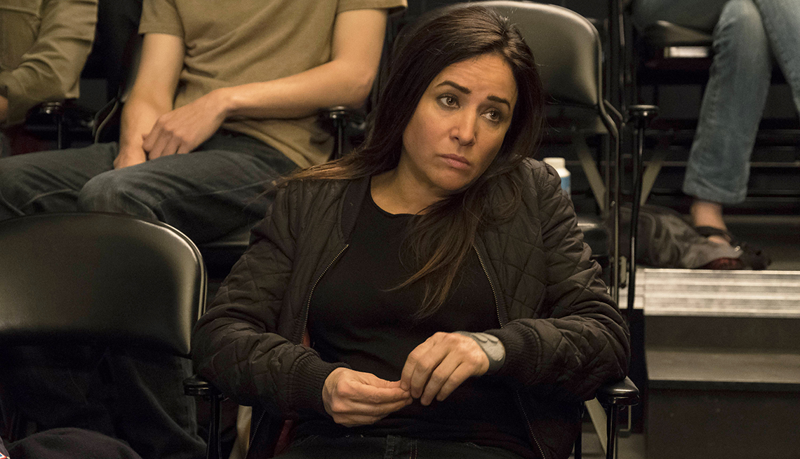 Pamela Adlon as Sam Fox in a scene from "Better Things," she's sitting in a chair.