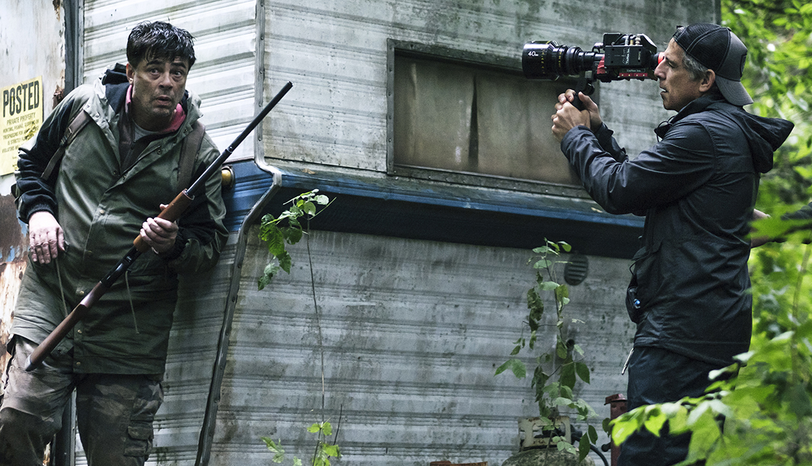 Ben Stiller holding a camera behind the scenes on "Escape at Dannemora."