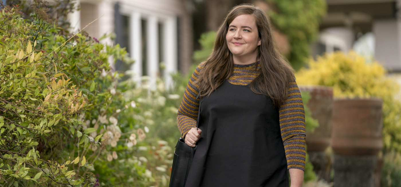 Aidy Bryant walks down the street in a scene from 'Shrill'