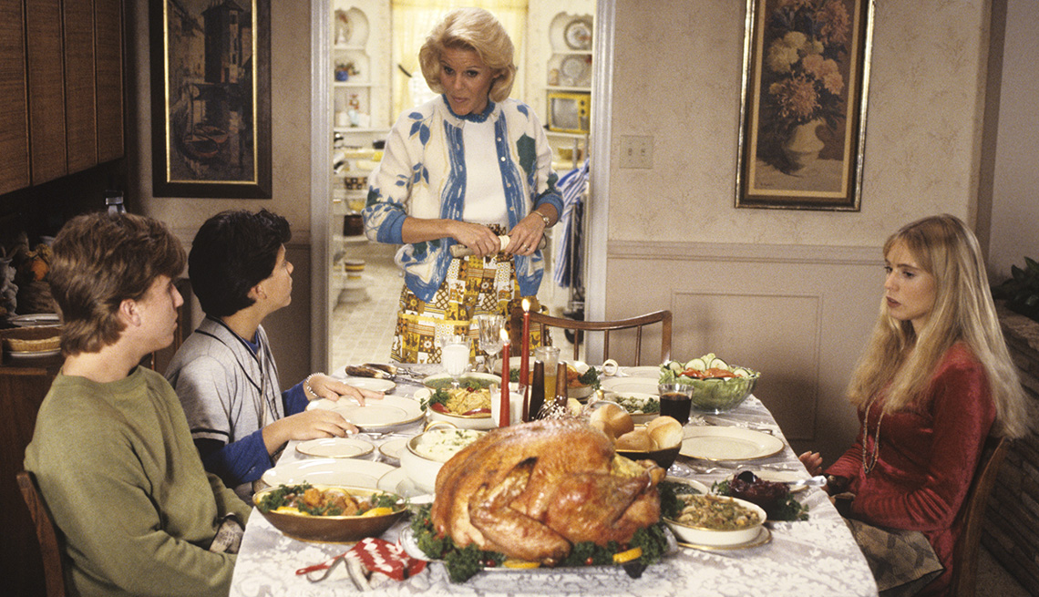 Jason Hervey, Fred Savage, Alley Mills and Olivia d'Abo at the Thanksgiving dinner table on The Wonder Years