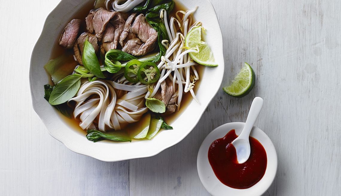 item 6 of Gallery image - Vietnamese Pho Dish, Noodles, Broth, Vegetables, Lime, AARP Food And Recipes, Authentic Asian Dishes