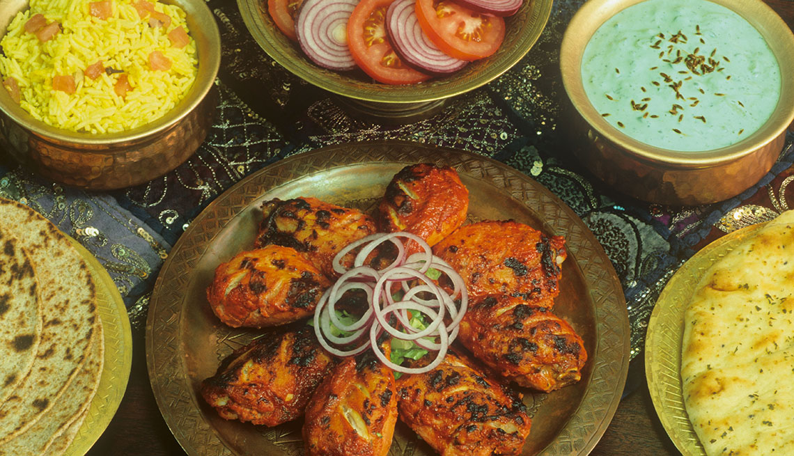 item 8 of Gallery image - Tandoori Chicken With Cucumber Raita, Tomato Salad, CousCous And Naan, Indian Food, AARP Food And Recipes, Authentic Asian Dishes