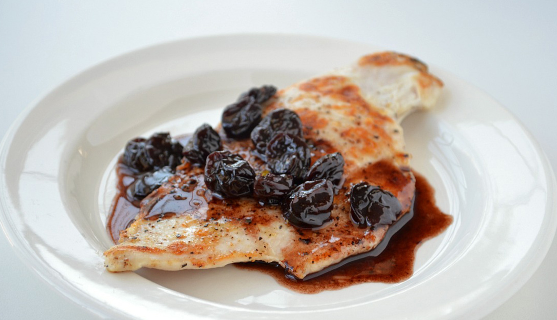 Sauce Made From Port And Cherries Over Chicken Cutlet, AARP Food And Recipes, Eight Healthy Chicken Recipes