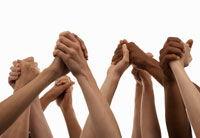 Arms raised holding hands-microgiving to charities online