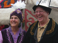 Ginger and Fritz Morrison in traditional Kyrgyz dress during Kyrgyz Culture Day.