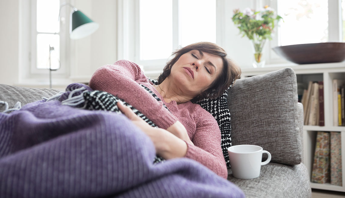 mature woman not feeling well taking a nap