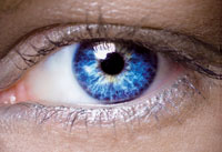 Close-up of woman's eye illustrates article on aging eyesight