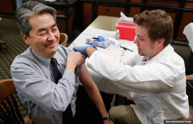flu shot influenza symptoms vaccine stomach needle nasal options health winter (Rich Pedroncelli/AP Photo)