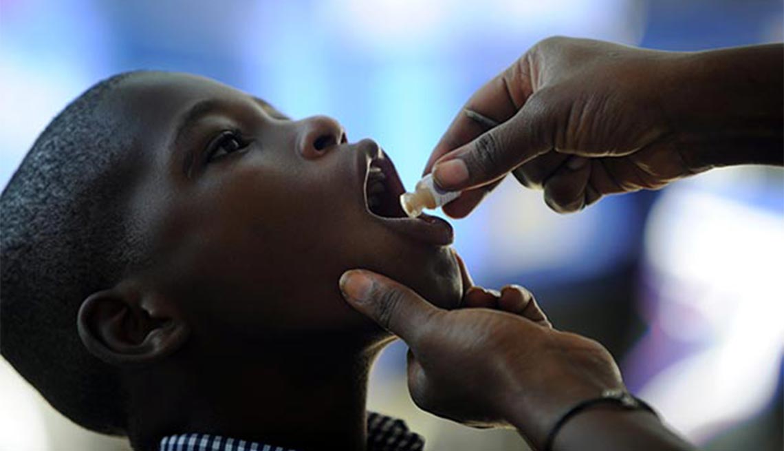 Boy, Cholera vaccine, Haiti, 2014, Plagues and Epidemics Through the Ages,
