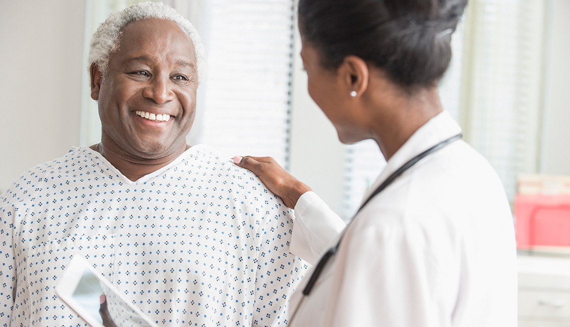 African American patient talking to the doctor