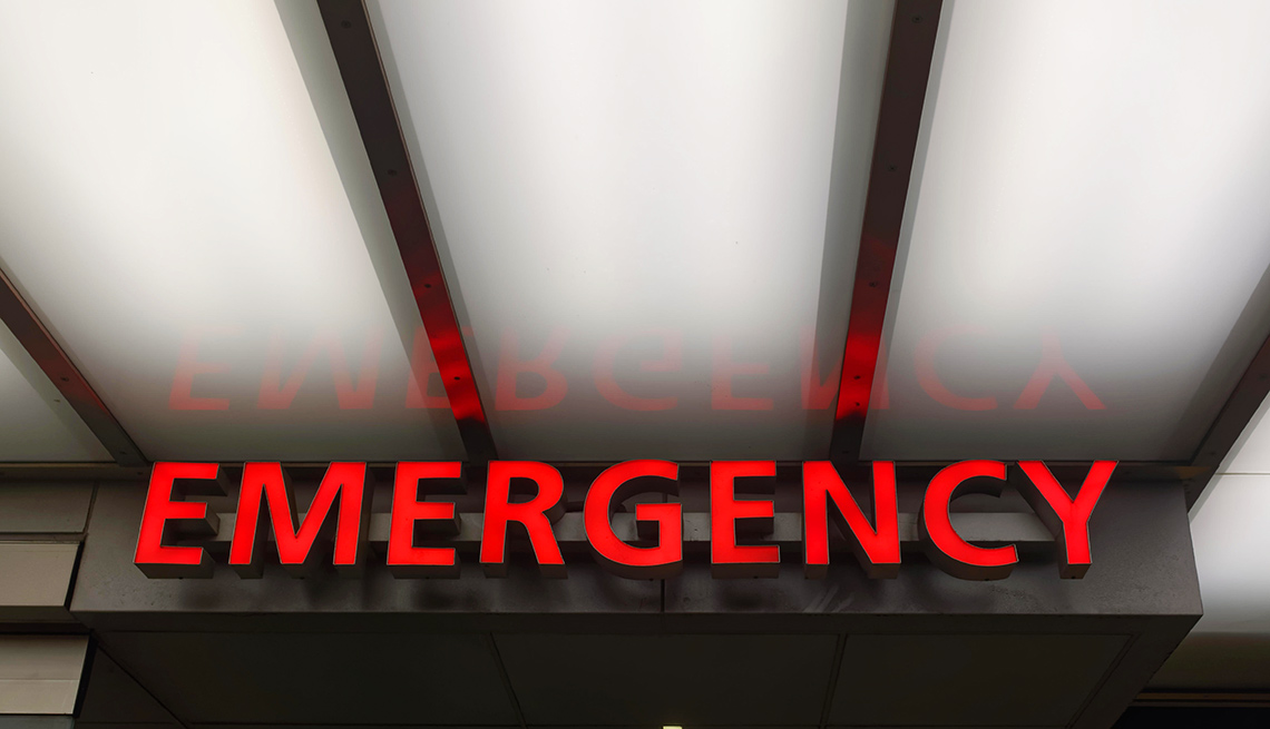 A bright red emergency room sign