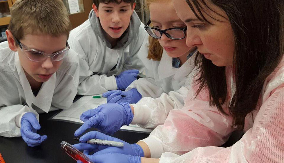 a group of 6th grade students called germinators gathered at university of Iowa Laboratory