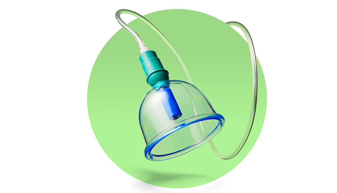 a cupping tool on a green background