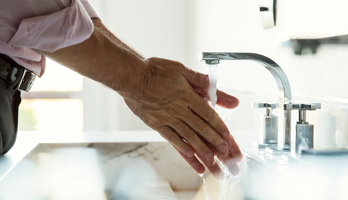 man washing hands