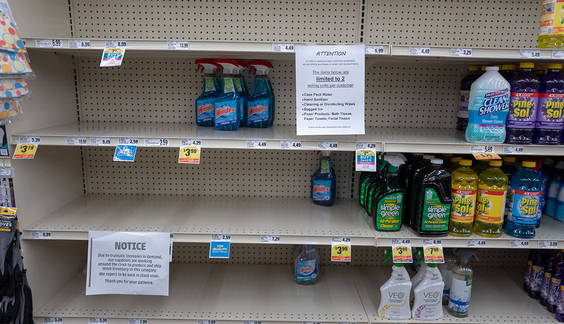 Grocery store shelves empty of most cleaning supplies.
